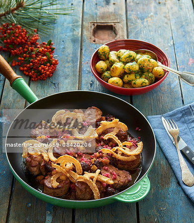 Pork medallions with apple and plum compote