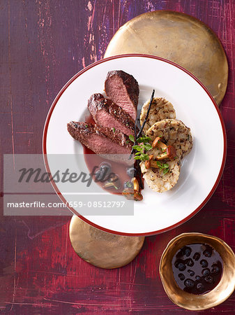 Fillet of venison with a blueberry sauce and chanterelle mushroom dumplings Fillet of venison with a blueberry sauce and chanterelle mushroom dumplings