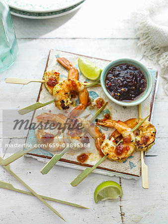Grilled prawns marinated with lime, ginger and garlic with home made sweet chilli sauce,