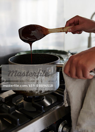 Chocolate sauce being prepared (English Voice Over)