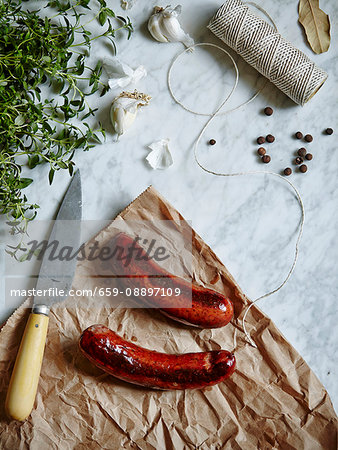 Fine meats and delicatessen. Served on a white marble Fine meats and delicatessen. Served on a white marble