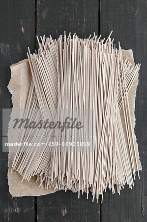 Soba noodles on a dark wooden table