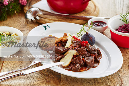 Vension goulash and venison escalope in breadcrumbs with porcini mushrooms, red cabbage and Spätzle (soft egg noodles) Vension goulash and venison escalope in breadcrumbs with porcini mushrooms, red cabbage and Spätzle (soft egg noodles)