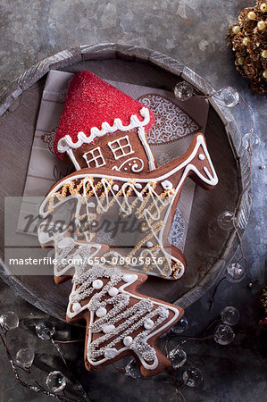 Christmas gingerbread biscuits (shaped like a Christmas tree, horse and house)