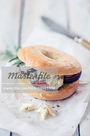 A bagel with blue cheese and figs A bagel with blue cheese and figs