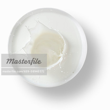 A splash of milk in a bowl A splash of milk in a bowl
