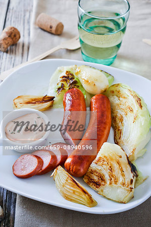 Sausages with grilled vegetables and sauce Sausages with grilled vegetables and sauce