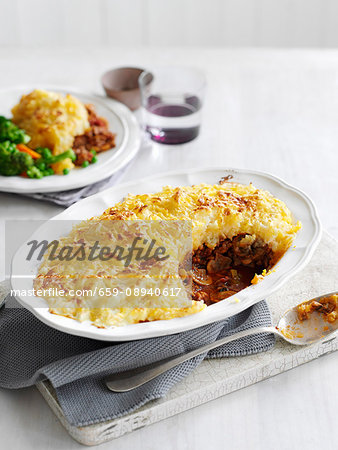 Cottage pie with a portion removed Cottage pie with a portion removed