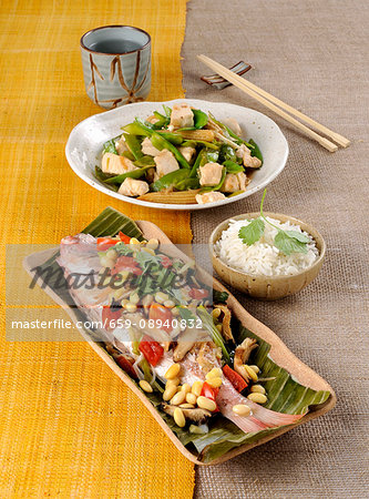 Steamed pandora in a banana leaf, and stir-fried chicken with vegetables