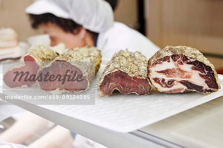 Various types of meat on a meat counter (Spain)