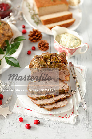 Beef roast with bay leaves and a herb and caper mayonnaise