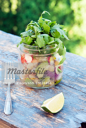 Healthy salad to go in a mason jar