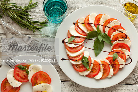 Tomatoes with mozzarella and basil Tomatoes with mozzarella and basil