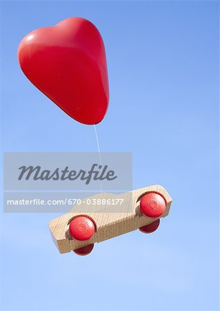 Heart shaped balloons and wooden hot wheels Heart shaped balloons and wooden hot wheels