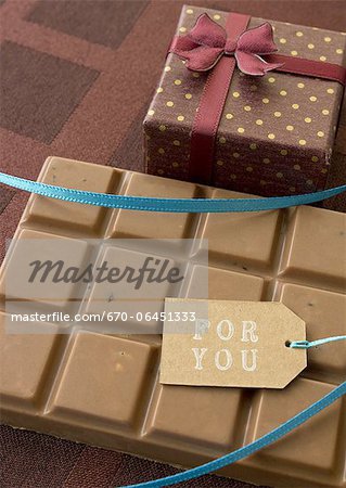 Bar of chocolate and a gift box Bar of chocolate and a gift box