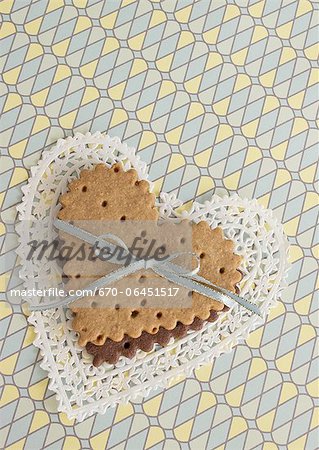 Heart-shaped cookies tied with a ribbon Heart-shaped cookies tied with a ribbon