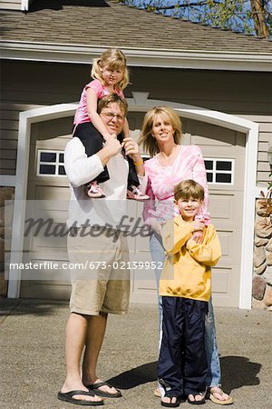 Family portrait outside house