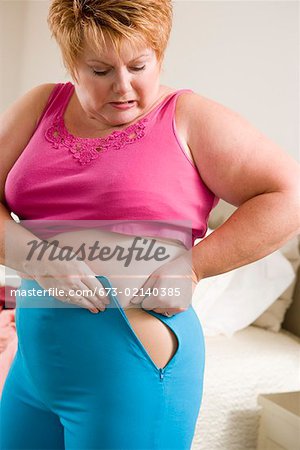 Premium Photo  Overweight woman wears small size clothes.