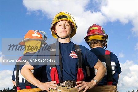 Portrait of female firefighters outside