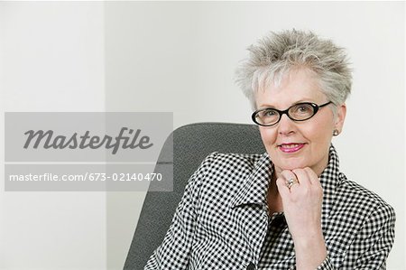 Portrait of stylish middle aged businesswoman