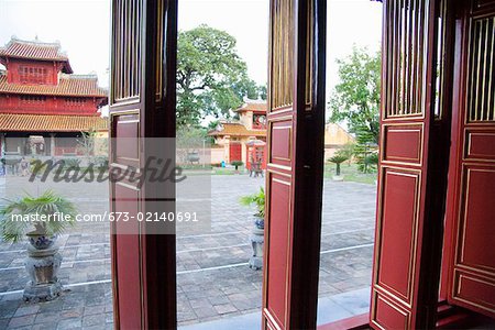 Wooden doors to courtyard at Vietnamese citadel