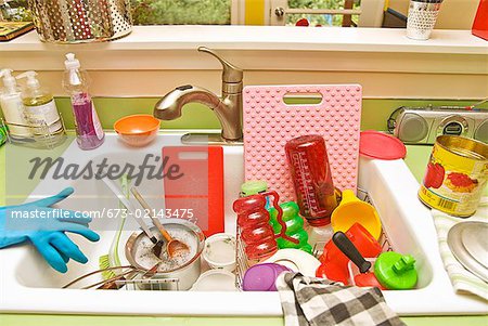 Dirty Dishes Sink Royalty-Free Images, Stock Photos & Pictures