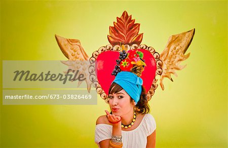 young woman wearing fruit hat