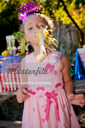 Young girl in birthday party outfit