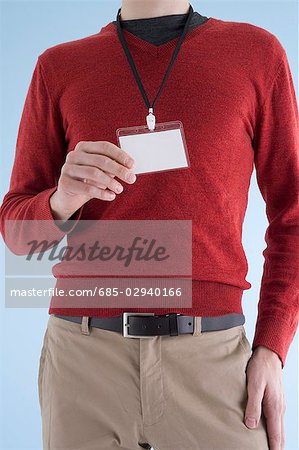 Man wearing ID card