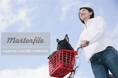 Young woman and French Bulldog