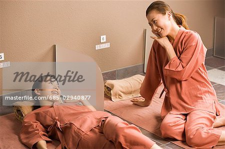 Young women enjoying bedrock bath