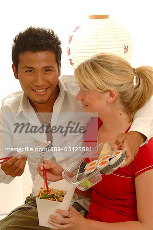 Couple with Asian food