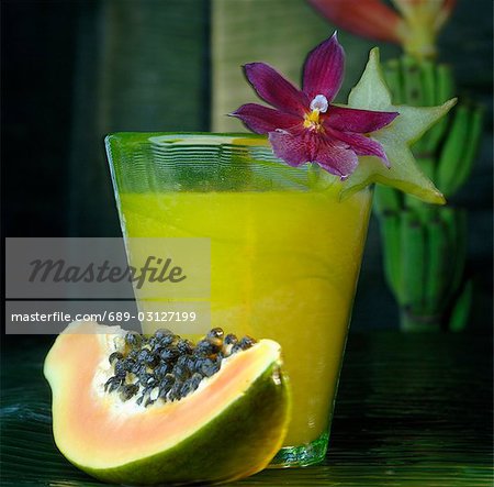 Papaya and a glass of juice