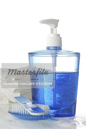 Liquid soap and brush