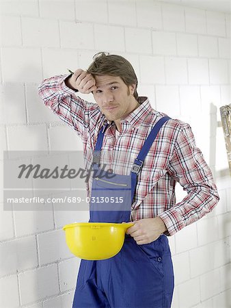 Construction worker with helmet