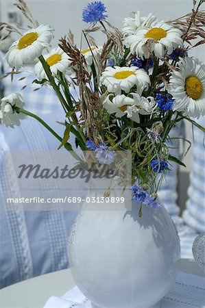 Bunch of Marguerites and corn flowers