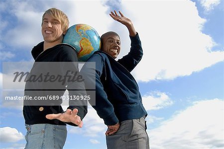 Two men with globe