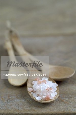 Himalayan salt on wooden spoon