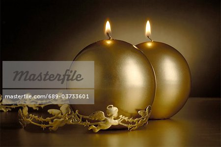 Two golden Christmas candles