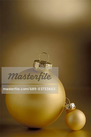 Two golden Christmas baubles