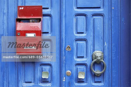 Red Mailbox At Blue Front Door Stock Photo Masterfile