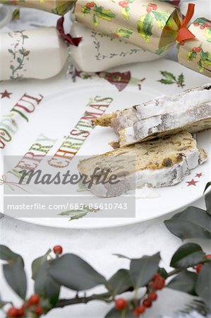 Christmas crackers and Stollen on plate
