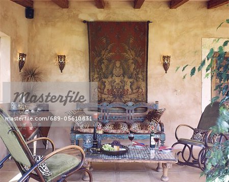 Mediterranean loggia with rocking chairs