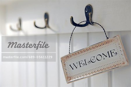 Welcome sign on hook