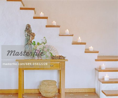 Stairs with burning candles