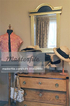 Ladieswear at dresser with mirror