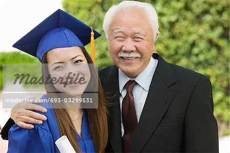 Graduate and Grandfather outside, portrait