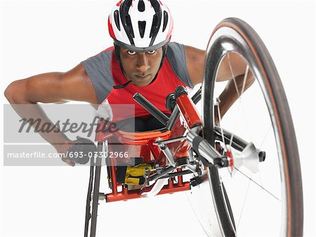 Paraplegic cycler, low angle view