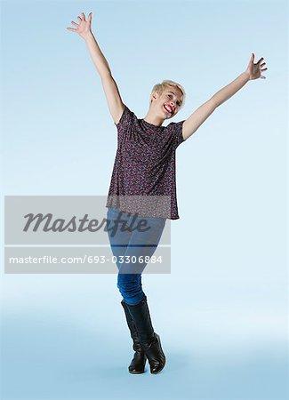 Enthusiastic Man smiling big arms stretched out in front palms up