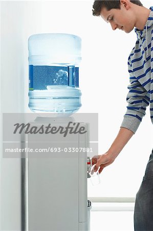 Water dispenser Stock Photos, Royalty Free Water dispenser Images